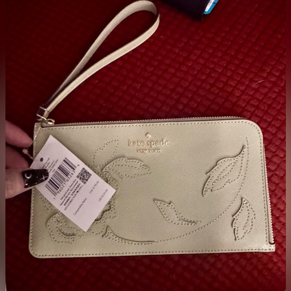 Kate Spade Sage NWT Embossed Flower
wristlet - Picture 1 of 6